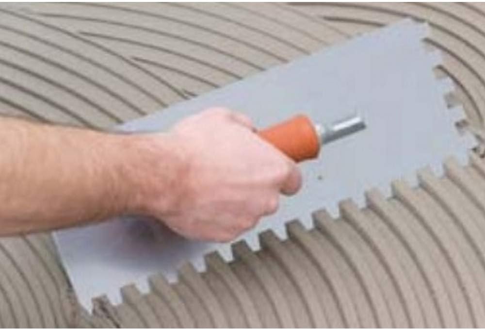 Raimondi - Oblique serrated trowel with rubber handle